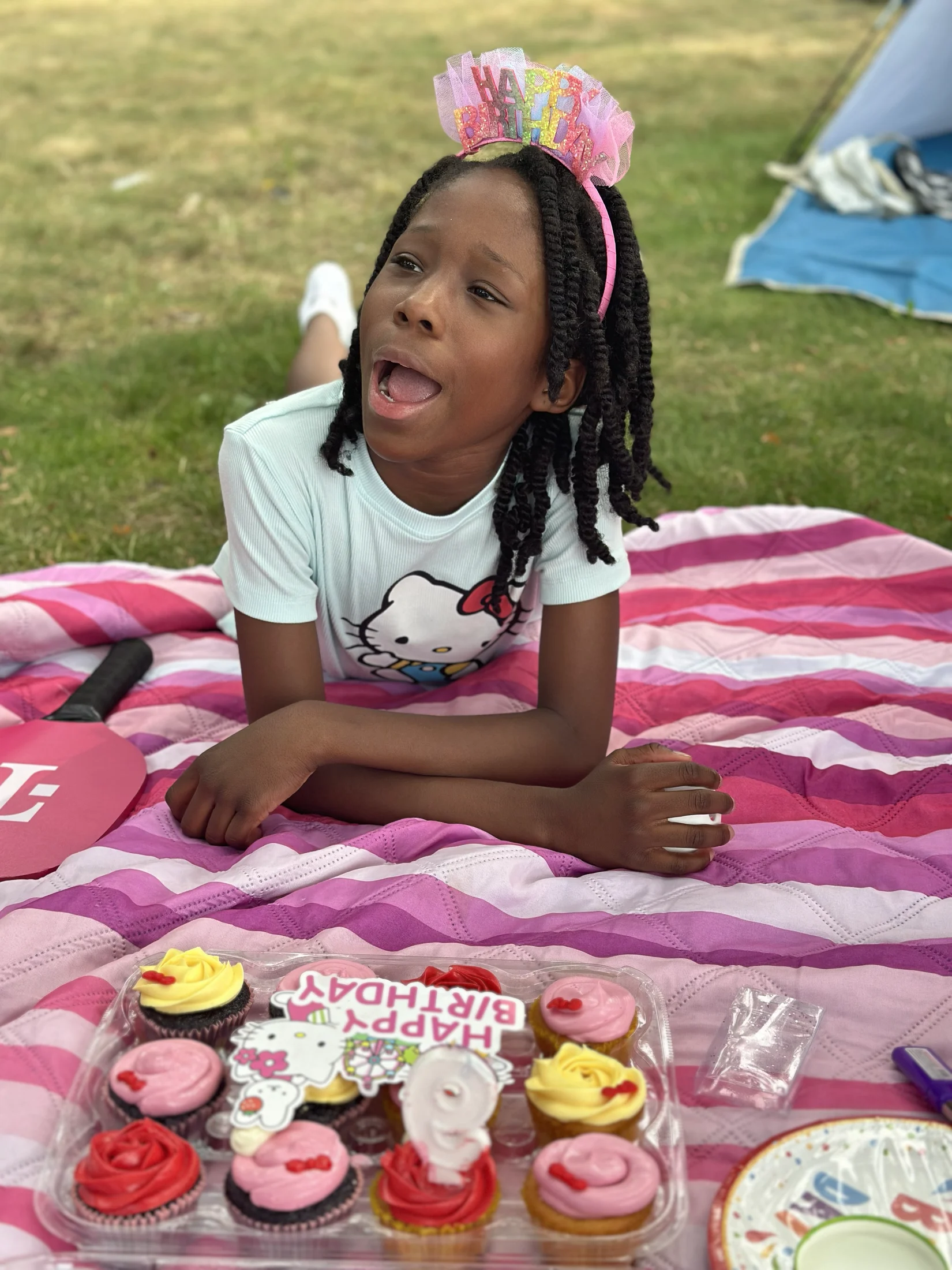 Avi laughing at her birthday picnic